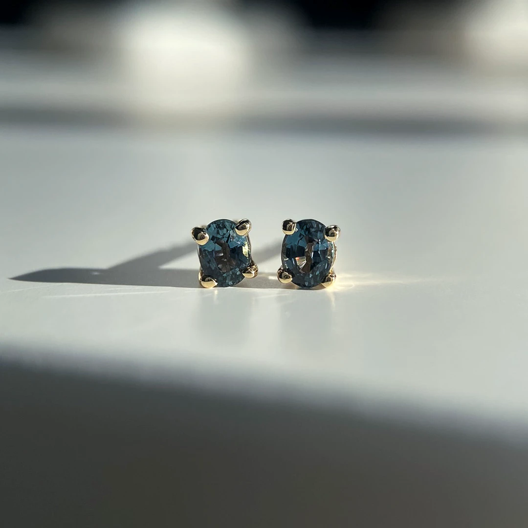 0.48ct Oval Teal Sapphire Stud Earrings in 9K Yellow Gold